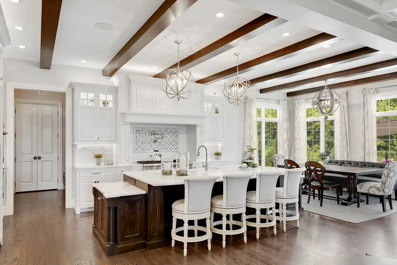 home renovation of kitchen in St. Tammany - by Red Beard. White kitchen with brown accent colors. Dark wood, recessed lighting, custom fixtures, custom doors and cabinets